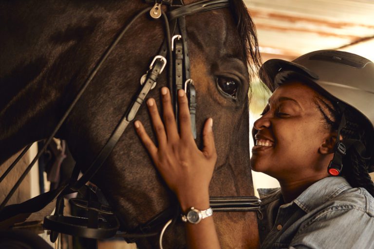 black woman with horse