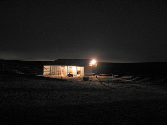 horse barn lights at night