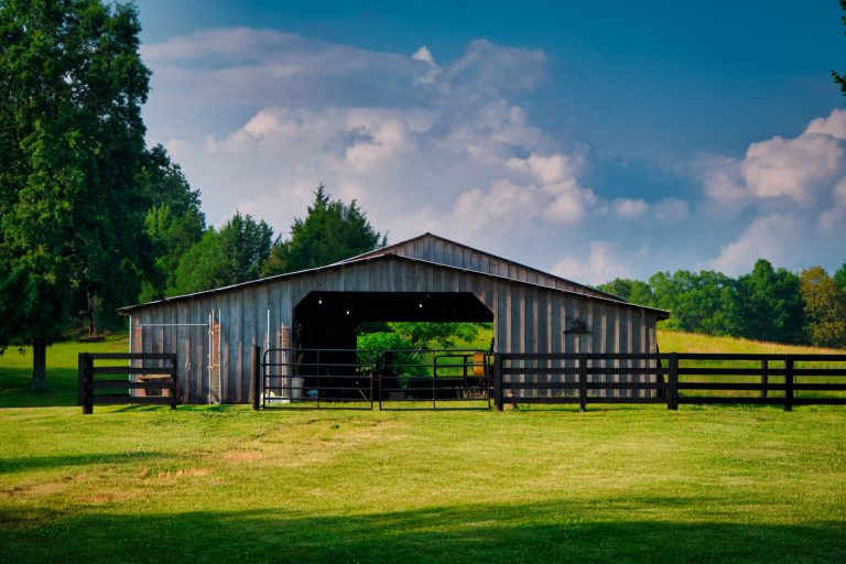 horse barn with a beautiful blue sky-scaled
