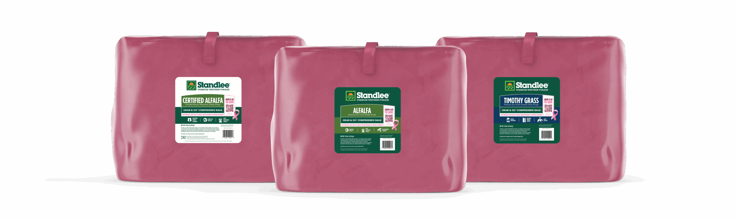 Three bales of Standlee forage wrapped in pink packaging for breast cancer awareness campaign