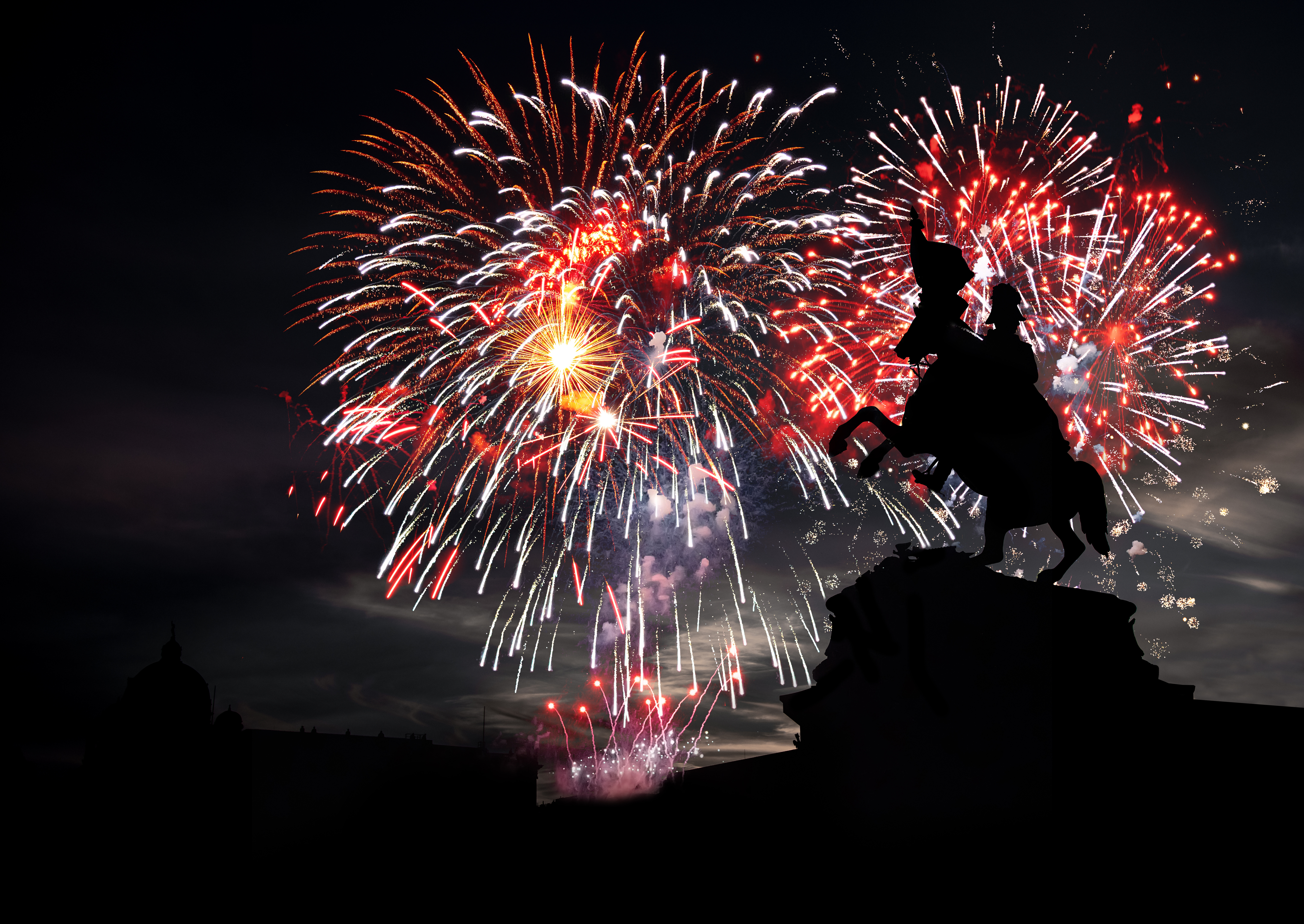 Fireworks in the backgroud of an equestrian statue